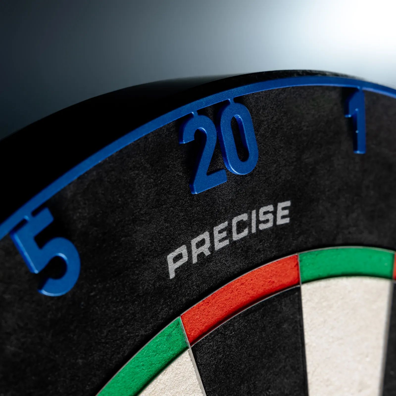 Das Bild zeigt ein Dart-Zubehör. Es handelt sich um einen OnePiece Lasercut Zahlenring ArcticBlue.