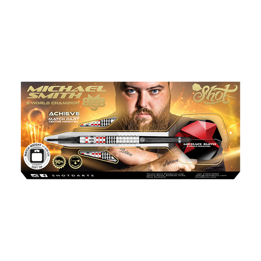 Shot Michael Smith Achieve Softdarts Auf dem Bild ist eine Packung mit Softdarts der Marke Shot zu sehen, die vom Weltmeister Michael Smith beworben wird. Die Verpackung zeigt ein Bild von Michael Smith und hebt die Eigenschaften des Produkts hervor.