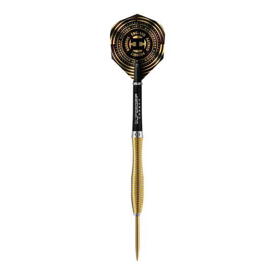 Harrows Anniversary Edition V-Wing Steeldarts Dies ist ein goldfarbener Steeldart mit einer schwarzen und goldenen Flight. Auf dem Flight steht „Harrows Anniversary Edition“ und andere Beschriftungen in goldener Farbe.
