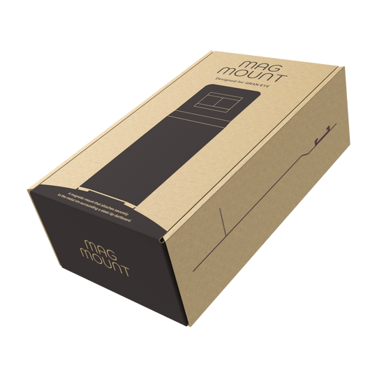 GranDarts Gran Eye Mag Mount Befestigung Die Abbildung zeigt eine Verpackung des Produkts "GranDarts GranEye Mag Mount Befestigung". Die Schachtel ist aus braunem Karton und trägt die Aufschrift "Mag Mount".